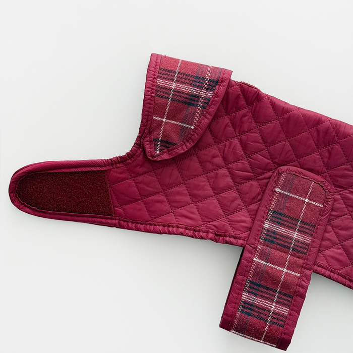 Quilted dog coat in mulberry plaid with velcro closure from Cocopup London.