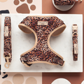 Quilted leopard print dog lead and collar set from Cocopup London on a white marble surface.
