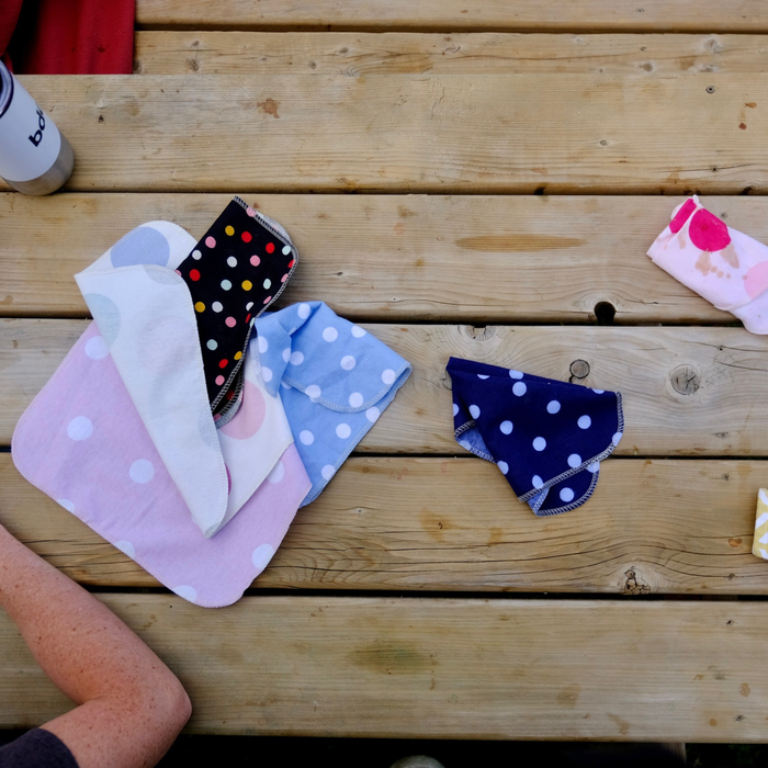 Polka dot Non-Paper Towels on a wooden picnic table, some of which were used to wipe ice cream from messy faces :)
