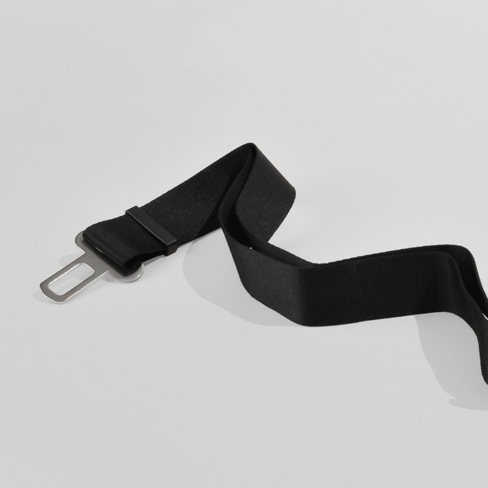 Plain black Cocopup London seat belt restraint with a metal buckle on a white background.