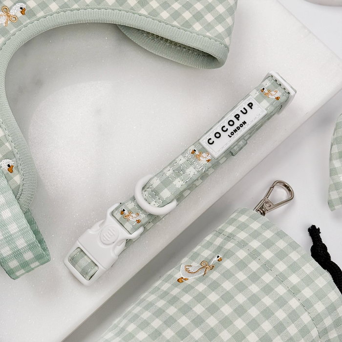 Green and white check print dog collar with embroidered geese design.
