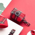 Tartan-patterned Cocopup London poop bag holder with black clip, matching collar and harness.