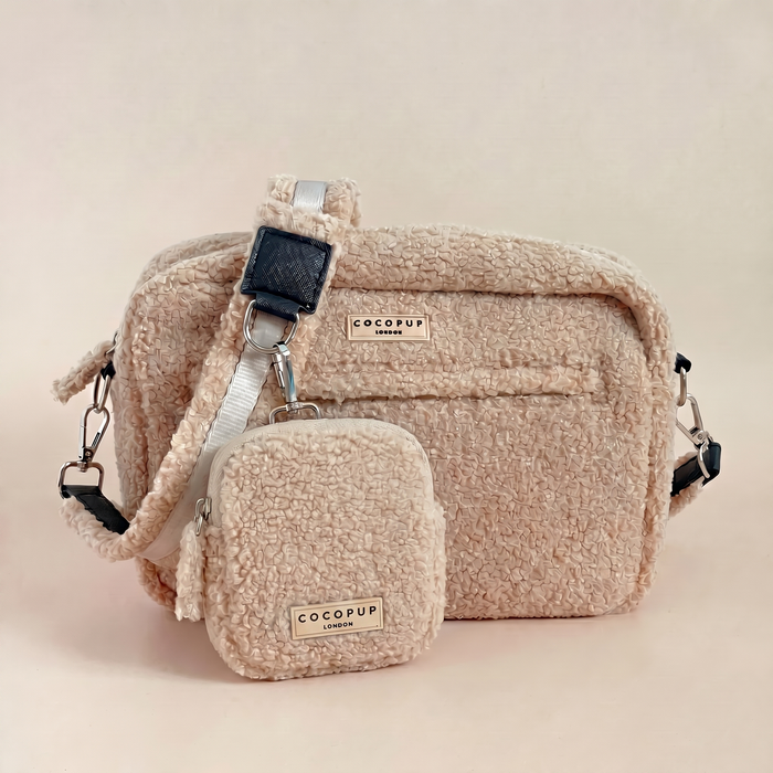 Beige textured Cocopup London Teddy Rupert dog walking bag with matching treat pouch on a neutral background.