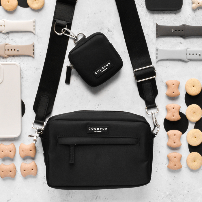 Black Cocopup London dog walking bag bundle with dog treats and watch bands displayed alongside.
