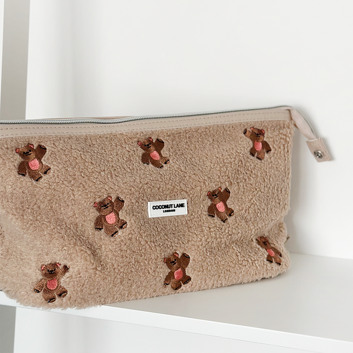 Beige teddy-texture expandable makeup bag with Theo embroidered design and zip closure from Cocopup London.