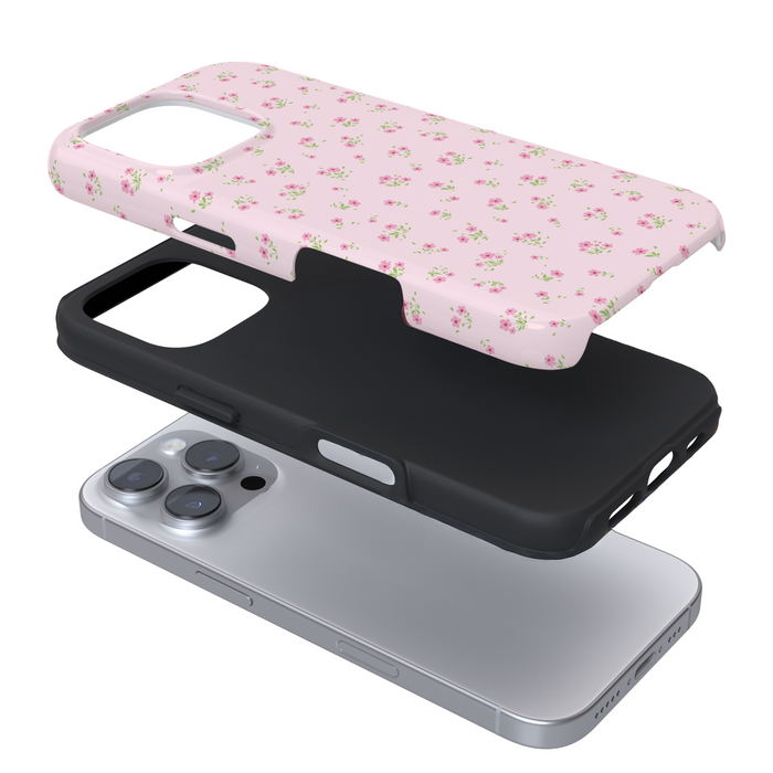 Expanded phone case with a pink floral pattern on a white background