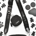 Cocopup London Teddy Baloo treat pouch in soft brown with paw and bone pattern, attached strap, on white background.