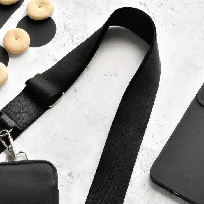 Black Cocopup London Ultimate Rucksack Bundle featuring a sleek design with matching accessories.