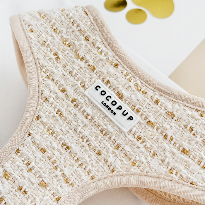 Vanilla textured tweed dog harness by Cocopup London, shown close-up against a light background.