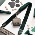 Forest green leash, treat pouch, bone-shaped treats, and Cocopup London dog walking bag with matching velvet strap.