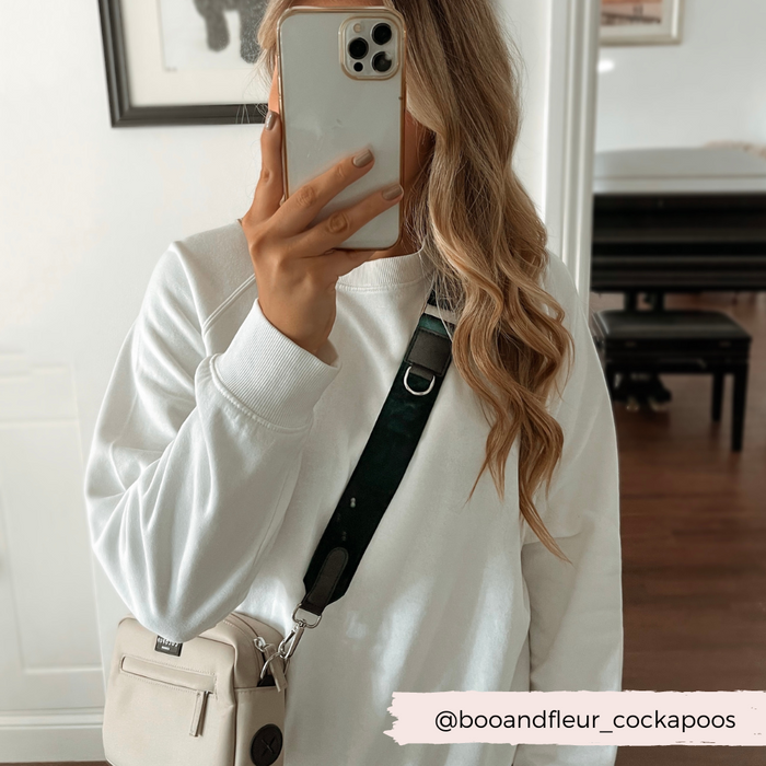 girl-wearing-velvet-forest-green-bag-strap-with-caramel-bag-and-treat-pouch