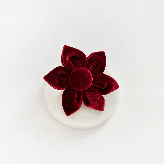 Berry red velvet collar flower with petal detailing by Cocopup London, designed to attach to a dog collar.