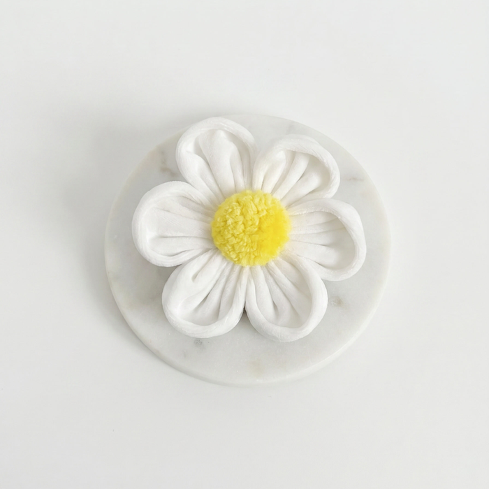 White flower with yellow centre, to attach to Dog Harness or Collar.